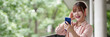 © snowing12 - Asian Young Adult Woman Enjoy Music Podcast Smartphone Outdoors Happy Listening Headphones Relaxed Lifestyle Digital Media Communication Technology