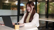 © snowing12 - Asian woman freelance remote work laptop cafe digital nomad professional happy productive flexible lifestyle modern environment successful business