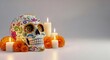 © Sergii - Sugar skull celebrating day of the dead with candles and flowers