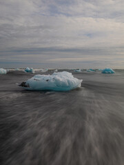Wall Mural - Beautiful view of diamond beach with big ice blocks on the shore.