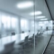 © Luna Whisper - Close-up of frosted glass conference room wall, subtle silhouettes visible through translucent surface, professional meeting environment, perfect for business meetings and corporate concept.
