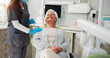 © Abrahams77/peopleimages.com - Dentist, consultation and senior woman with wellness, teeth whitening and inspection. People, doctor and patient with dental cleaning, calm and checkup with cosmetic dentures and hygiene results