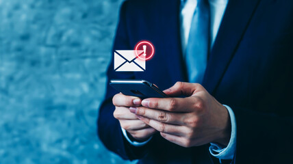 Businessman checking smartphone with email notification icon message communication