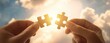 © dett - The puzzle pieces connecting at sunset symbolizing unity teamwork and shared purpose