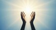 © JuliusGideon - Hands reaching towards a brilliant, radiant light in a bright blue sky, symbolizing hope, spirituality, and divine connection for a brighter future