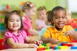 © Frame Vista - Diverse Group of Preschool Children Playing with Blocks in Classroom