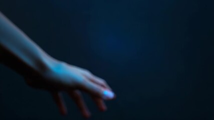 Wall Mural - open hand showing futuristic glowing lines of energy and data