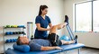 © Matiullah - A female physical therapist assists a male patient with a resistance band exercise for knee rehabilitation in a clinic.