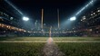 © Micro Pix - Commercial high-resolution photo of american football on the field at night with goal post and stadium lights in the background view at ground level.