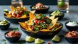 © Sona - Plate of nachos with salsa, jalapenos, and guacamole, surrounded by lime wedges and small bowls of sauces.