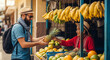 © Andres Mejia - Tourist buying pineapple from local vendor at street market in south america
