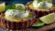 © Malik - Indulge in decadent key lime tarts, a refreshing dessert perfect for any celebration or sweet craving.