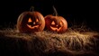 © Mufarokah - Two illuminated jack-o'-lanterns rest on a pile of hay against a dark background, creating a spooky yet inviting Halloween scene