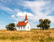 © kayu - Rural church in a golden field