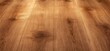© sun - Close-up view of natural wooden surface with visible grain patterns and warm lighting highlighting texture and knots