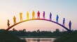 © Babar - Silhouettes of diverse people stand on a colorful bridge at sunset.