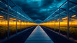 © Svetlana - Illuminated industrial greenhouse complex at night with modern architecture design
