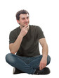 © 1STunningART - Pensive man seated on the floor, holds hand under chin positive thinking of new ideas isolated on transparent background