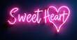 © antishock - Bright pink neon sign displays Sweet Heart text with heart shape. Dark background enhances glowing effect. Romantic, vibrant imagery.