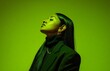 © MKS - A fashionable woman wearing a charcoal suit is set against a vibrant neon green backdrop in this contemporary fashion portrait, embodying a timeless and high-end aesthetic in a studio setting,
