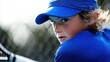 © icik icik bum - Focused young tennis player with a determined expression ready for the game ahead