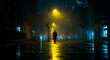 © Fathur - A solitary figure walking on a wet city street at night illuminated by streetlights