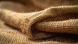 © Kitta Studio - Close-up of Natural Jute Fabric with Soft Texture and Warm Tones