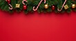 © MstZorina - Festive christmas garland with candy canes and ornaments on a vibrant red background