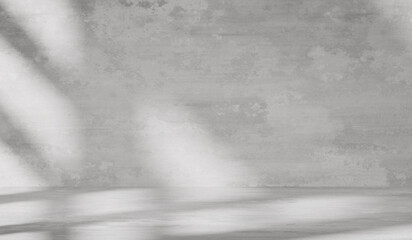 Wall Mural - Gray background with cement wall texture. Minimalist abstract background for product presentations with soft shadows from the window