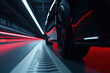© Aleksandra - Sleek modern car driving through illuminated tunnel with red and blue ambient lighting, dynamic low angle urban night scene