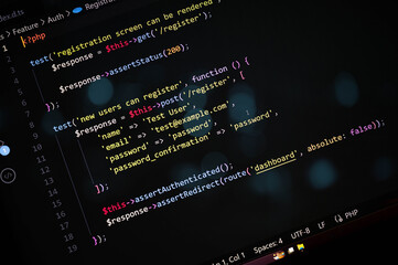close-up view of php source code testing user registration and authentication with dashboard redirec