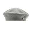 © Stock - Grey wool beret with single button detail, isolated on white background