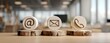 © Kevin - Wooden contact icons on a table