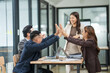 © aekachai - Asian business group delighted with success in their careers