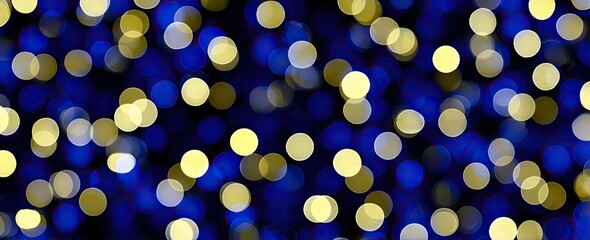 Abstract bokeh pattern of blue and gold circles