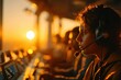 © whitestorm - Intense view of a young air traffic controller working at sunset with the sun behind him, professional headset on, in the tower, focused on his work.