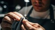 © angin - A skilled jeweler meticulously polishes a sparkling diamond engagement ring under a bright light, highlighting its exquisite brilliance and the intricate craftsmanship involved in fine jewelry making.
