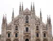 Daytime view of famous Milan Cathedral or Duomo di Milano on piazza in Milan, Italy