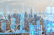 Double exposure of New York cityscape with blue holographic stock market data overlay. Financial technology and business concept. Double exposure