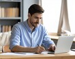 © aziz - Young Brazilian Professional Focused on Online Learning at Home Office