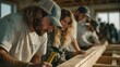 © Moshi Art - Focused Craftsmen Working Together on Wood Construction Project
