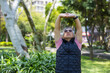 © leungchopan - Asian retired man doing stretching exercises outdoor