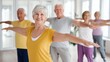 © Olga - Senior people doing fitness exercise in group – healthy aging, wellness and active lifestyle concept