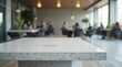 © galerymaregi - Speckled Gray Countertop Foreground in Blurred Modern Office