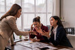 © Apichat - Businesswomen arguing during a stressful meeting about financial reports