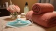 © Luminary Shots - Spa treatment table with towels, flowers, beauty products, and a face mask ready for a relaxing session
