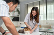© Kawee - Asian pet owner brings domestic cat to veterinary clinic for check up.