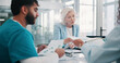 © Abrahams66/peopleimages.com - Doctor, documents and people in meeting, discussion and medical planning with information. Charts, healthcare or employees with teamwork, clinic results and problem solving with report analysis