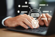 © Bank-adtapon - Close-up of hands typing on laptop with virtual chatbot icon and conversation bubbles, representing AI assistant, customer service automation, digital communication, and artificial intelligence tech.