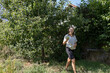 © Cavan Images - Country house. Family vacation in the summer garden. Eco